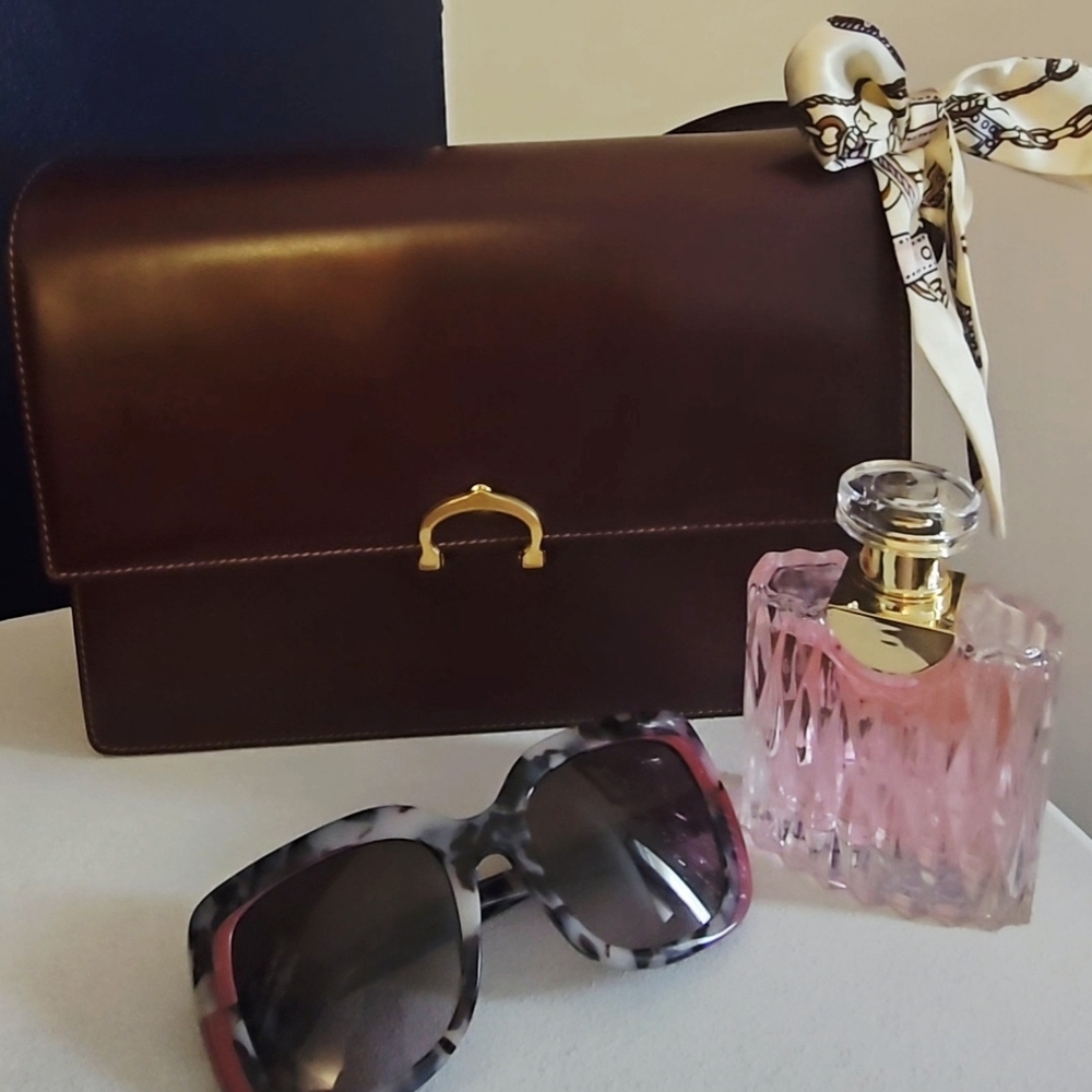 Elegant Brown Leather Bag with Gold Accent